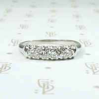 Gracefully Sculpted Diamond & Platinum Wedding Band