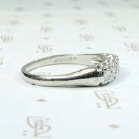 Gracefully Sculpted Diamond & Platinum Wedding Band