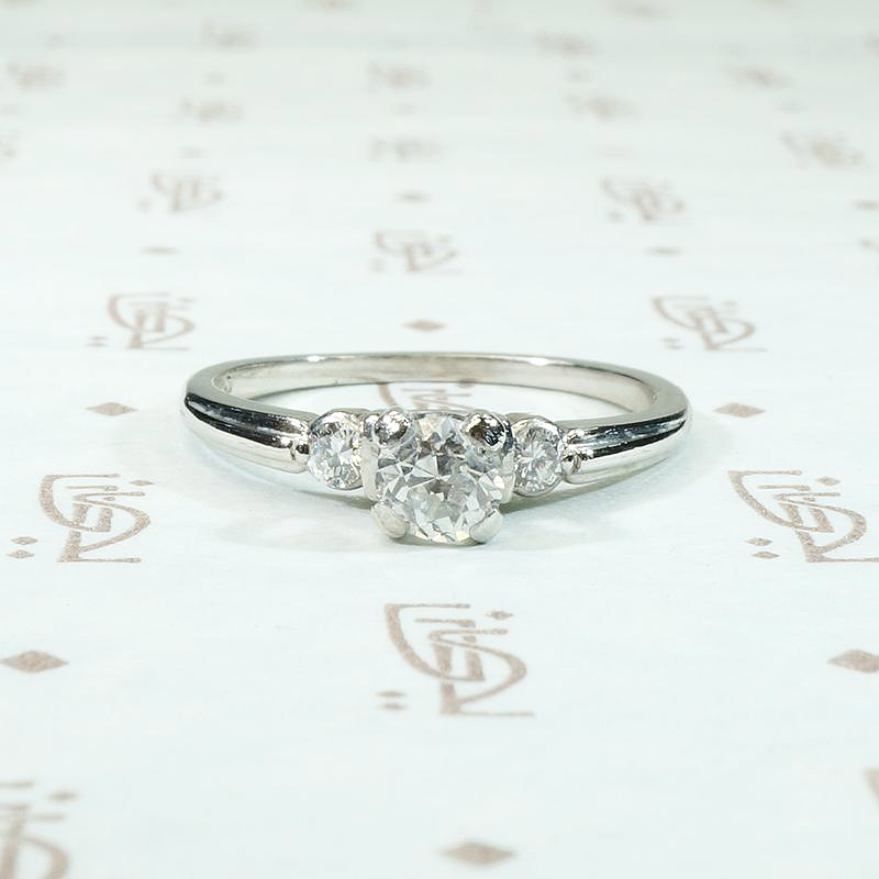 Tasteful Retro Three Stone Engagement Ring