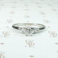 Tasteful Retro Three Stone Engagement Ring