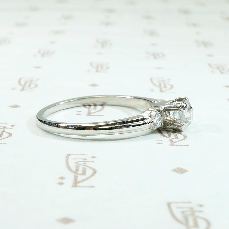 Tasteful Retro Three Stone Engagement Ring