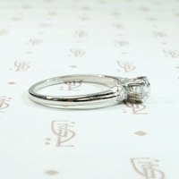 Tasteful Retro Three Stone Engagement Ring