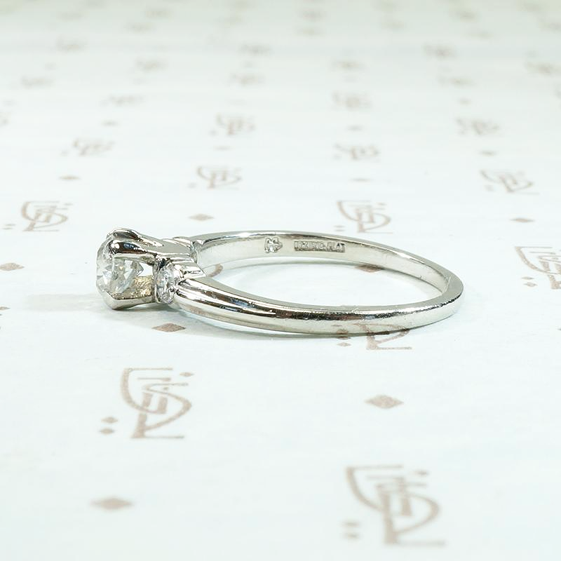 Tasteful Retro Three Stone Engagement Ring