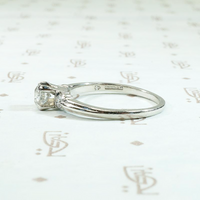 Tasteful Retro Three Stone Engagement Ring