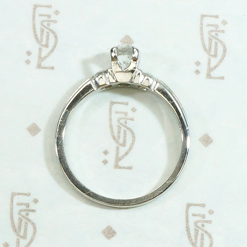 Tasteful Retro Three Stone Engagement Ring