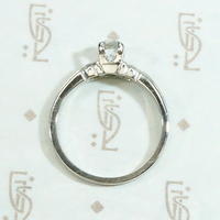 Tasteful Retro Three Stone Engagement Ring