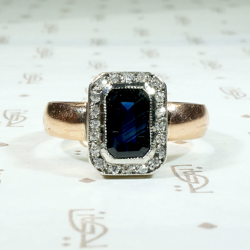 Inky Blue Sapphire & Diamond Halo Engagement Ring