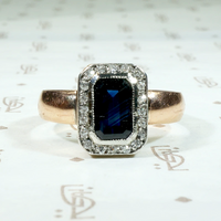 Inky Blue Sapphire & Diamond Halo Engagement Ring