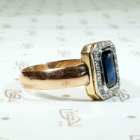 Inky Blue Sapphire & Diamond Halo Engagement Ring