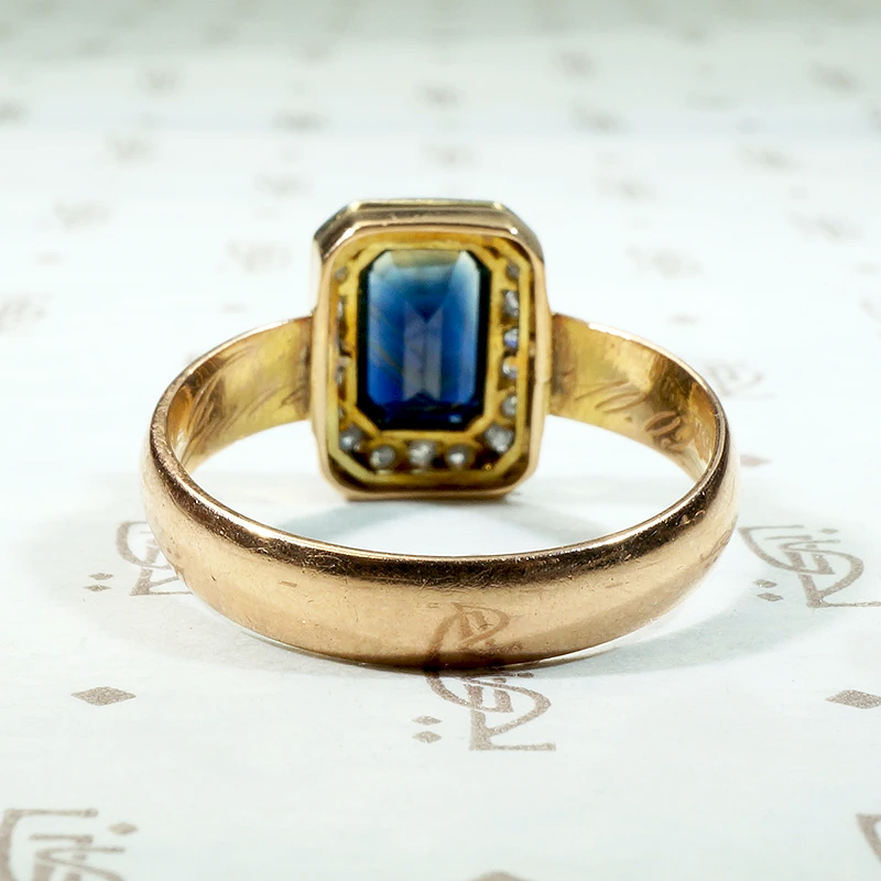 Inky Blue Sapphire & Diamond Halo Engagement Ring