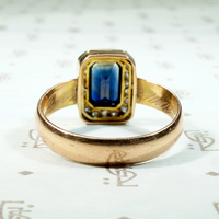 Inky Blue Sapphire & Diamond Halo Engagement Ring