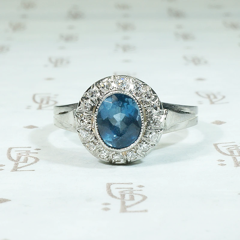 Icy Elegance Aquamarine Halo Ring in Platinum