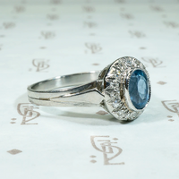 Icy Elegance Aquamarine Halo Ring in Platinum