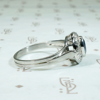 Icy Elegance Aquamarine Halo Ring in Platinum