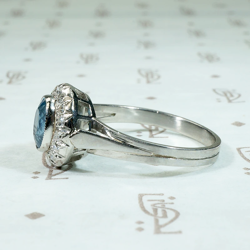 Icy Elegance Aquamarine Halo Ring in Platinum
