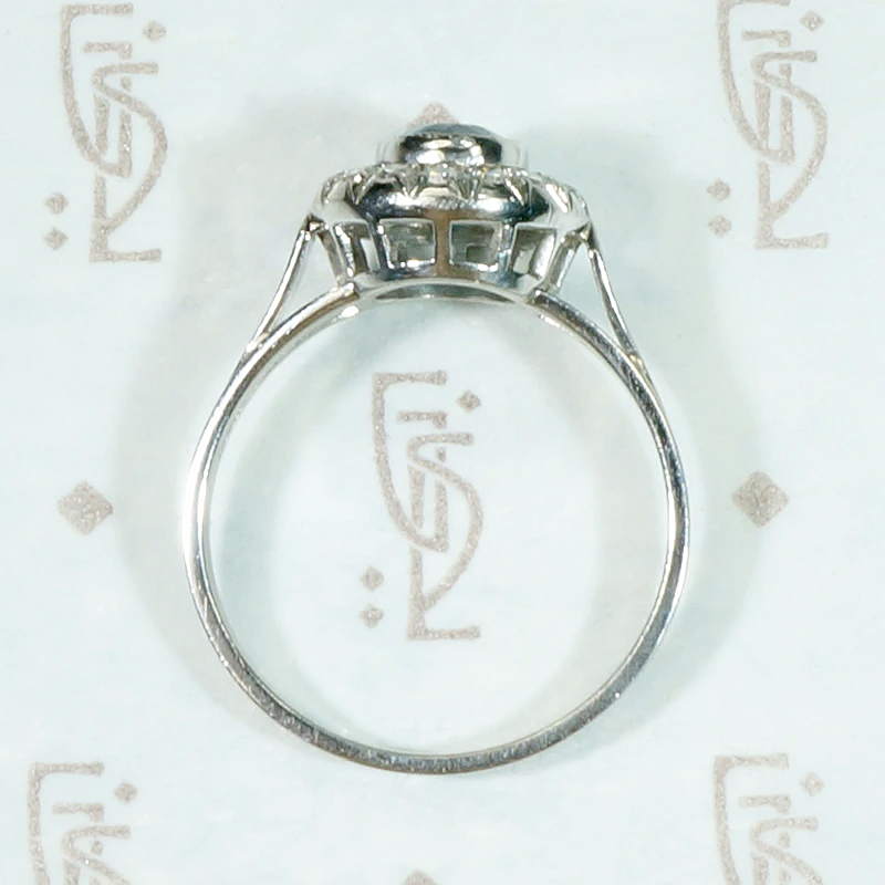 Icy Elegance Aquamarine Halo Ring in Platinum