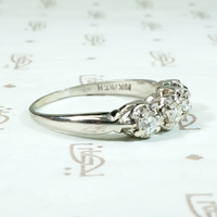 Four Diamonds in Curvaceous White Gold Band