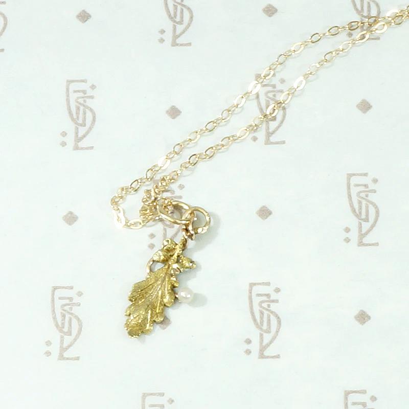 Delicate Gold Oak Leaf Pendant with Pearl Accent