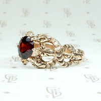 Six Snake Victorian Ring with Garnet in Rose Gold
