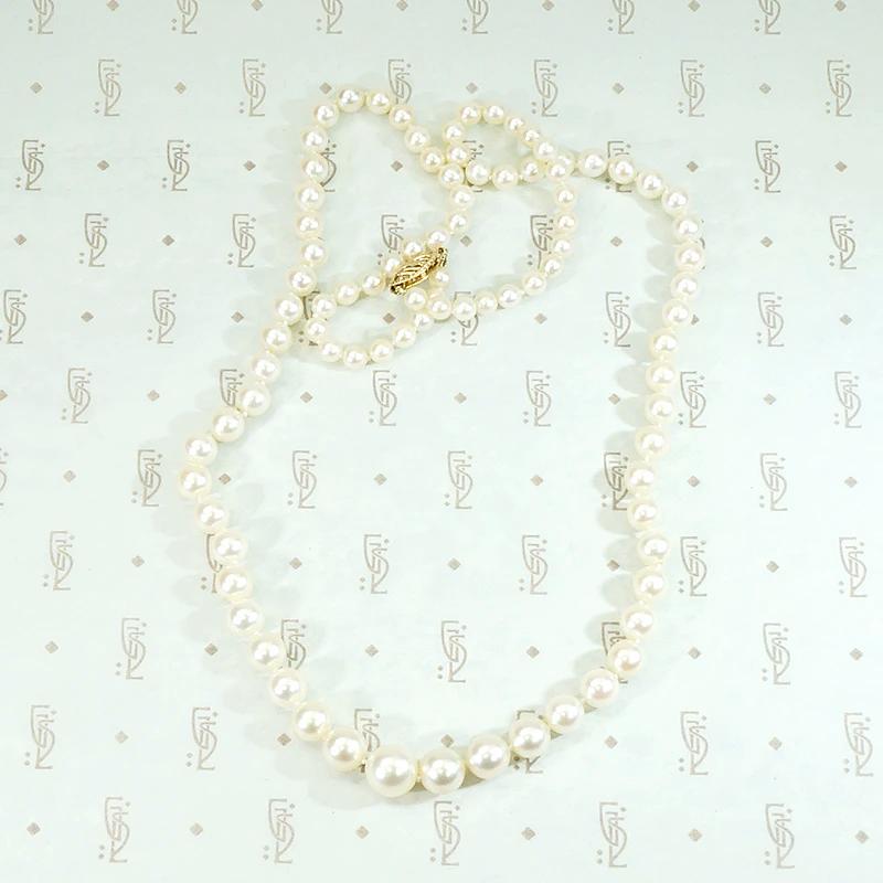 Radiant Strand of Pearls with Gold Clasp
