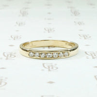 Mid Century Diamond Wedding Band in Sleek Gold