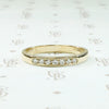 Mid Century Diamond Wedding Band in Sleek Gold