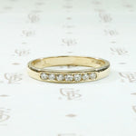 Mid Century Diamond Wedding Band in Sleek Gold