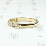 Mid Century Diamond Wedding Band in Sleek Gold