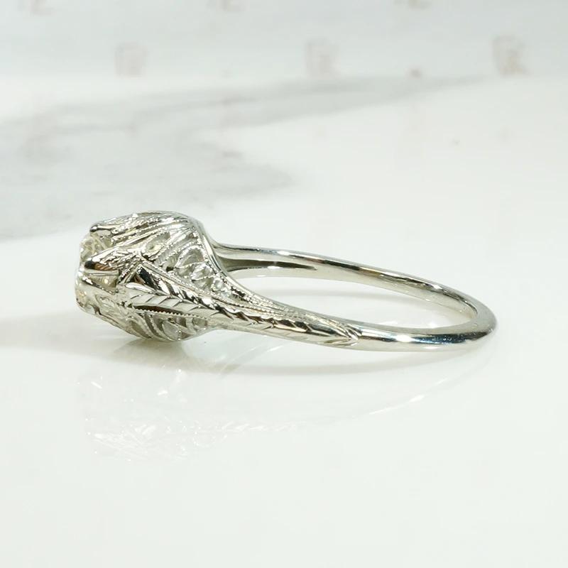 Glittering Filigree Diamond Solitaire Ring