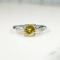 Dazzling Yellow Sapphire with Marquise Accent Diamond Ring