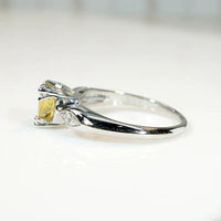 Dazzling Yellow Sapphire with Marquise Accent Diamond Ring