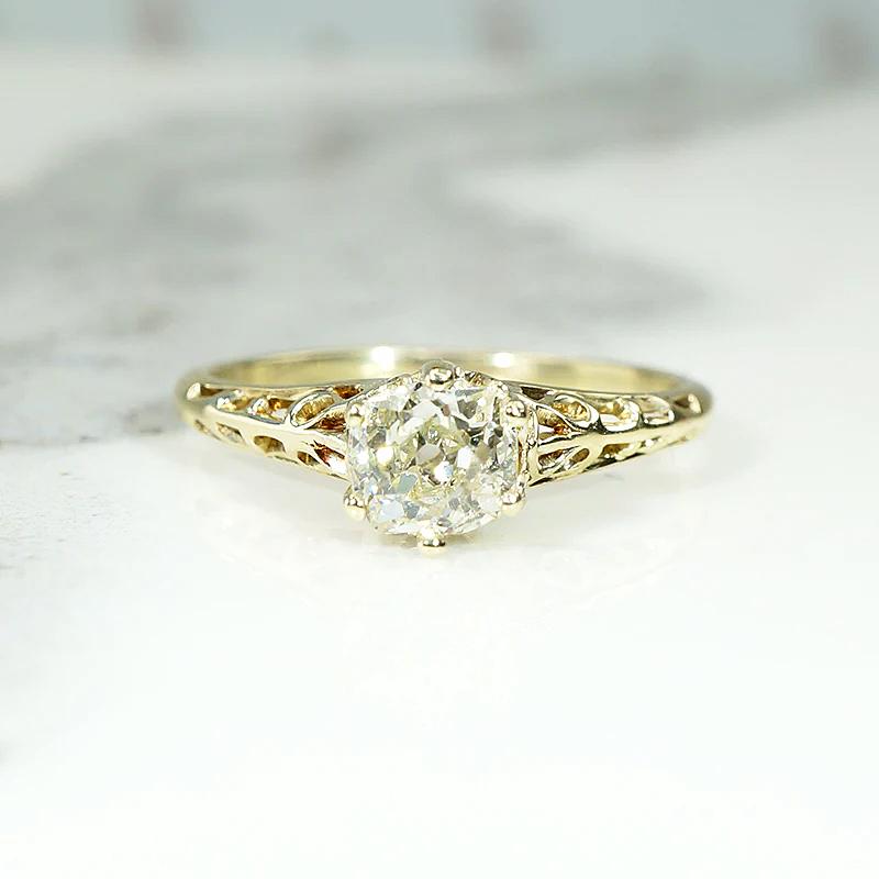 Pale Yellow Old Mine Diamond in Lacy Gold Solitaire