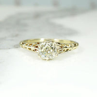 Pale Yellow Old Mine Diamond in Lacy Gold Solitaire