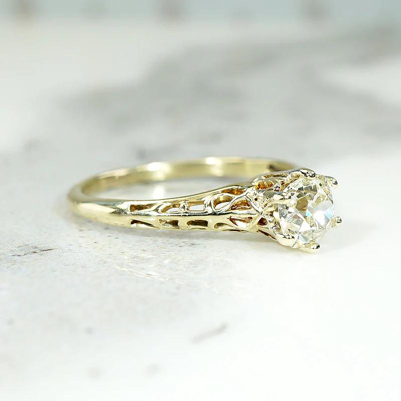 Pale Yellow Old Mine Diamond in Lacy Gold Solitaire