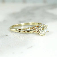 Pale Yellow Old Mine Diamond in Lacy Gold Solitaire