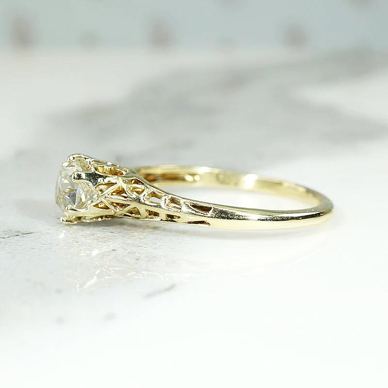 Pale Yellow Old Mine Diamond in Lacy Gold Solitaire
