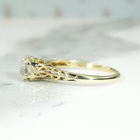 Pale Yellow Old Mine Diamond in Lacy Gold Solitaire