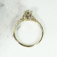 Pale Yellow Old Mine Diamond in Lacy Gold Solitaire