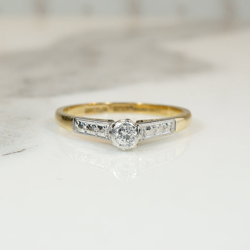 Dainty Arty Deco Platinum and Gold Diamond Solitaire