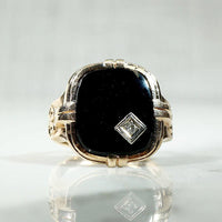 Charming Onyx Ring with Jaunty Diamond