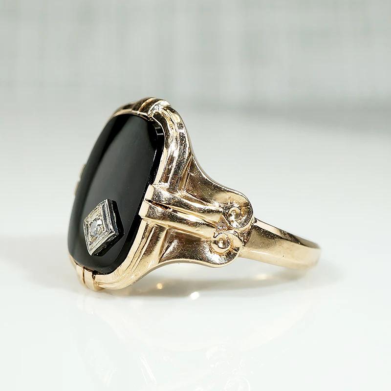 Charming Onyx Ring with Jaunty Diamond