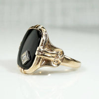 Charming Onyx Ring with Jaunty Diamond
