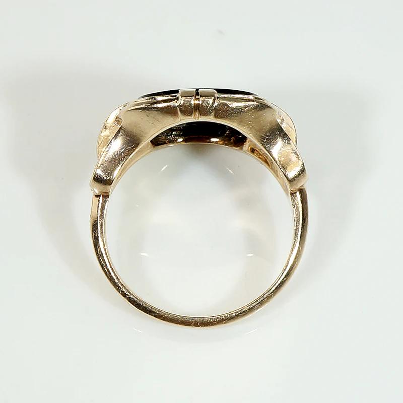 Charming Onyx Ring with Jaunty Diamond