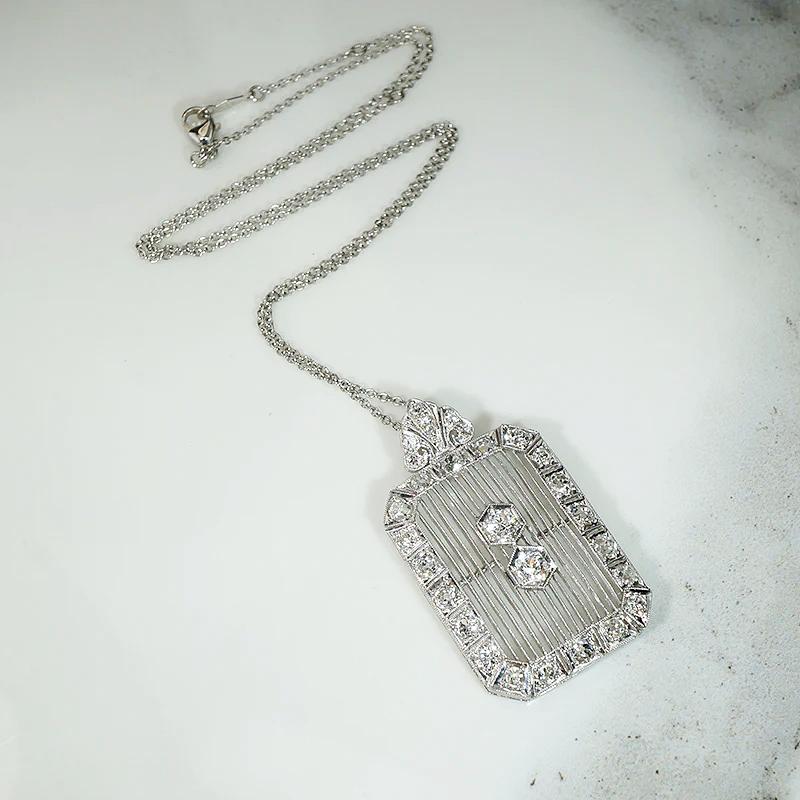 Diamond Encrusted Edwardian Platinum Filigree Pendant