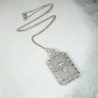 Diamond Encrusted Edwardian Platinum Filigree Pendant