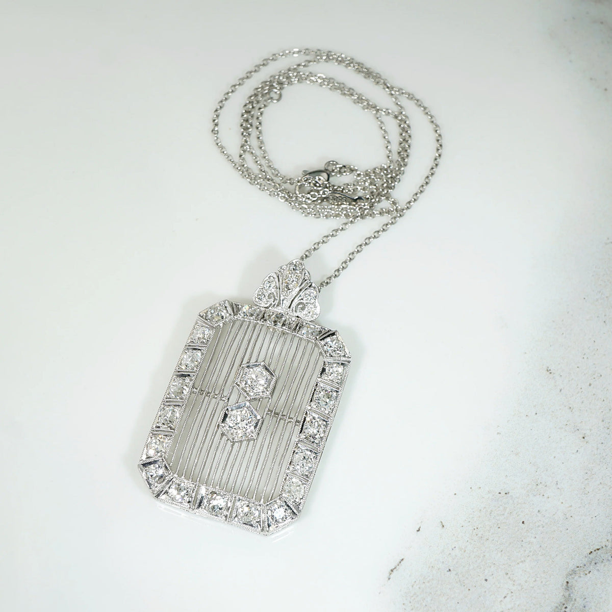 Diamond Encrusted Edwardian Platinum Filigree Pendant