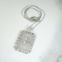 Diamond Encrusted Edwardian Platinum Filigree Pendant