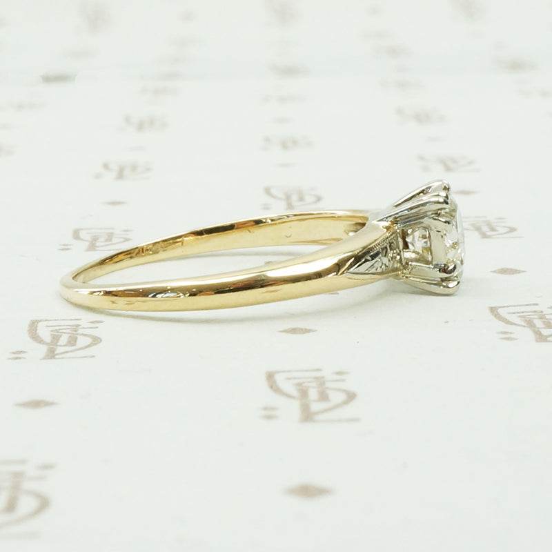 graceful 2 tone gold diamond engagement ring circa 1940