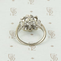 Diamond and White Gold Pinwheel Ring