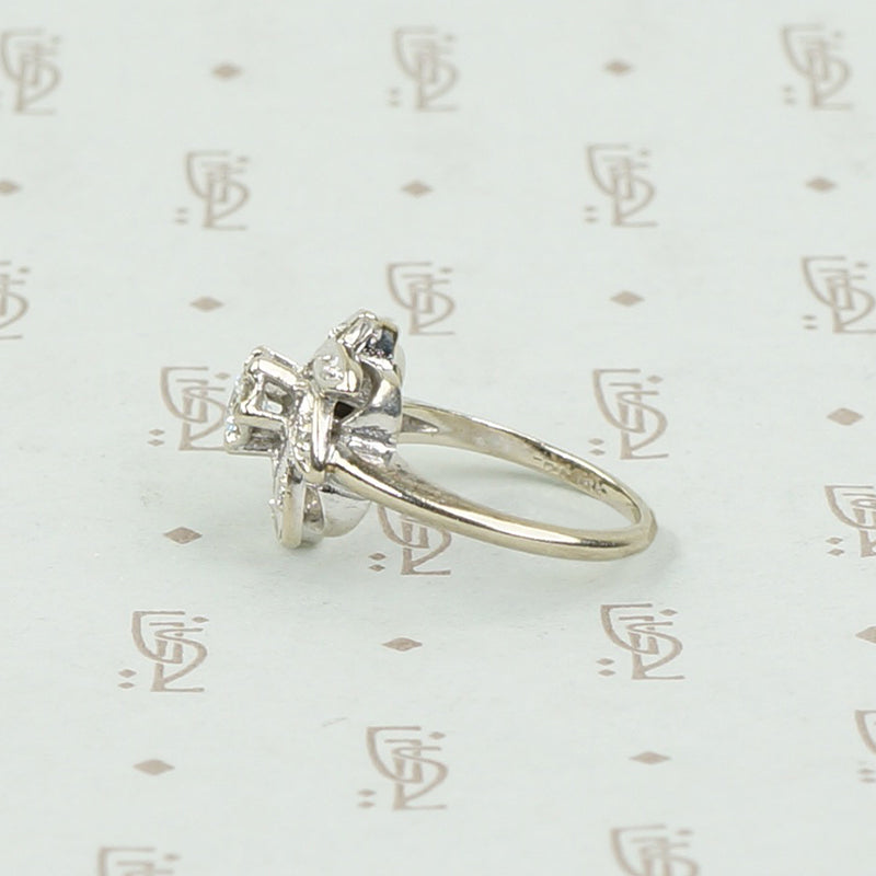 Diamond and White Gold Pinwheel Ring